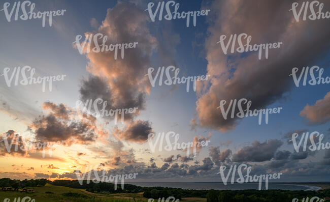 sunset with pink and golden clouds