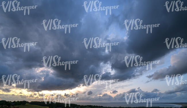 sunset with large dark clouds