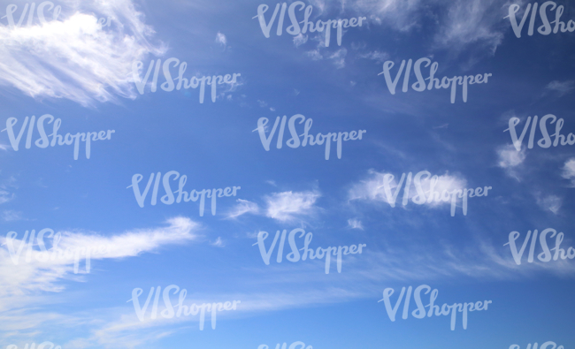 blue daytime sky with some cloud lines