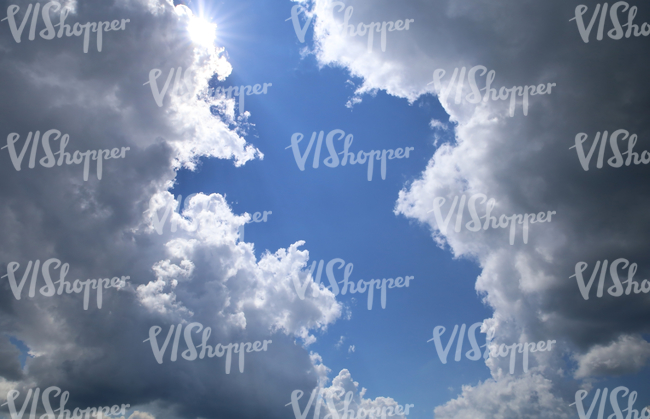 cloudy sky with a patch of blue sky