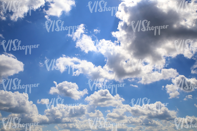 daytime sky with backlit clouds