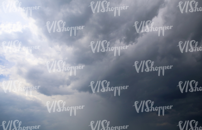 sky with a massive thunder storm cloud