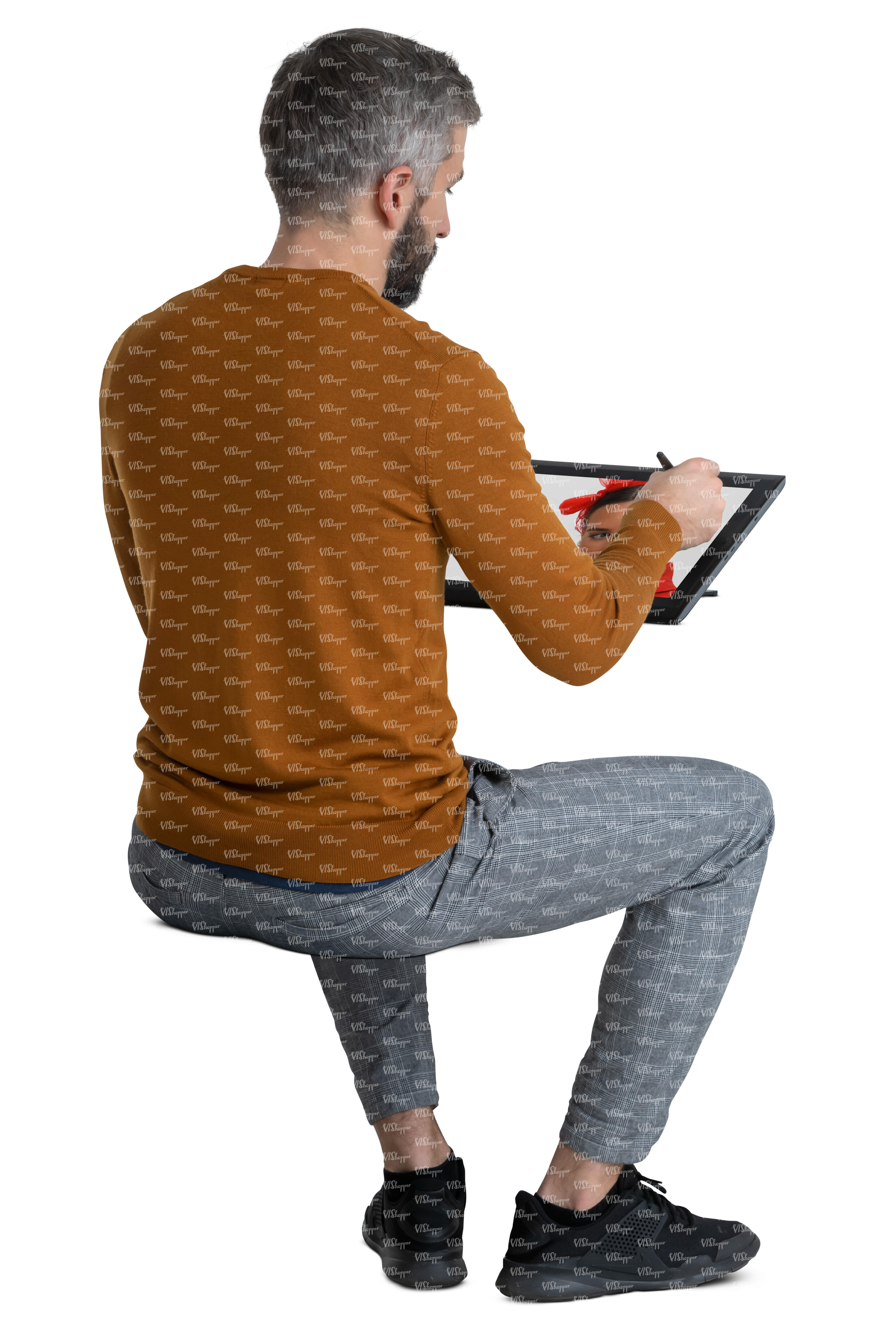 man sitting in chair side drawing