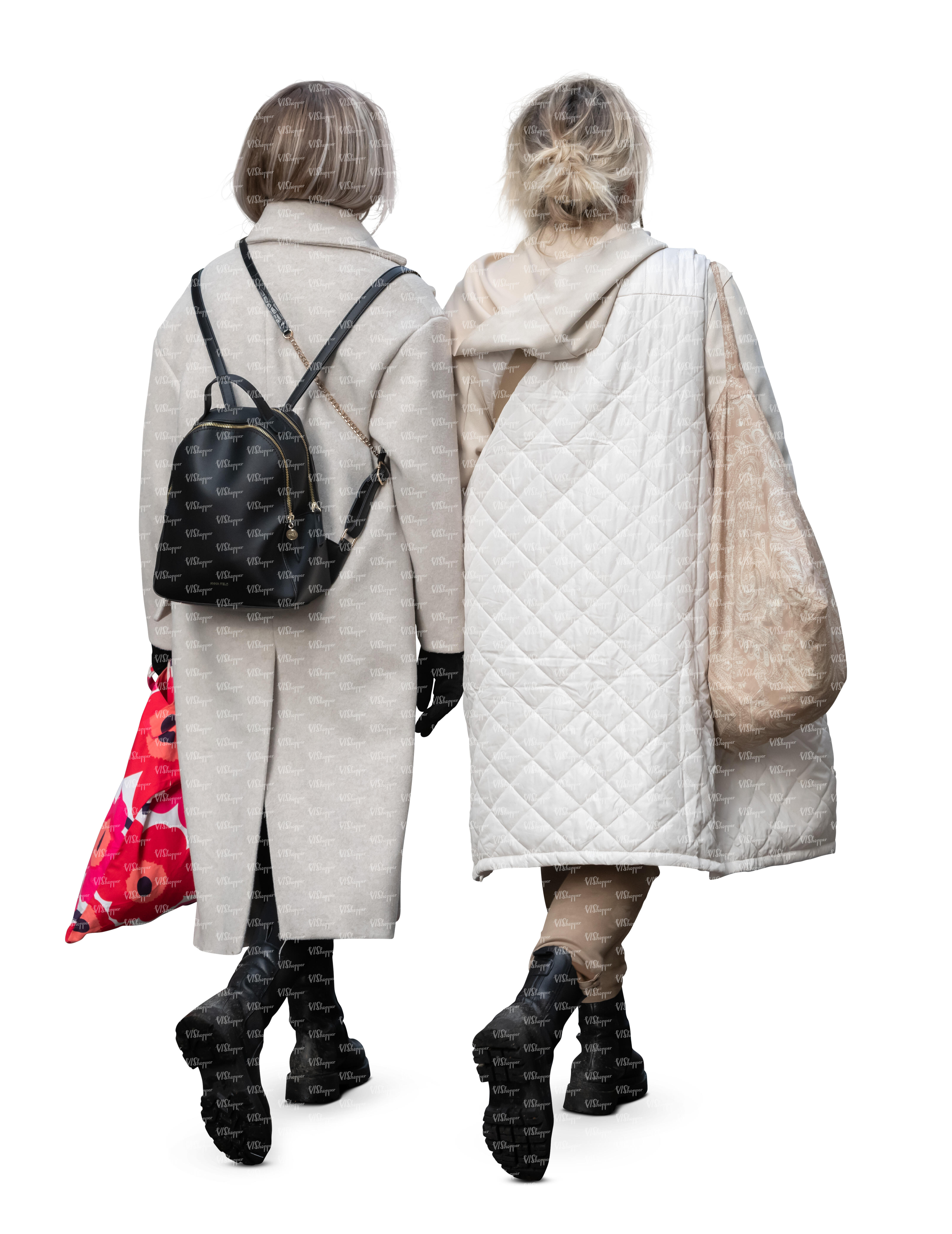 two women wearing light beige overcoats walking - VIShopper