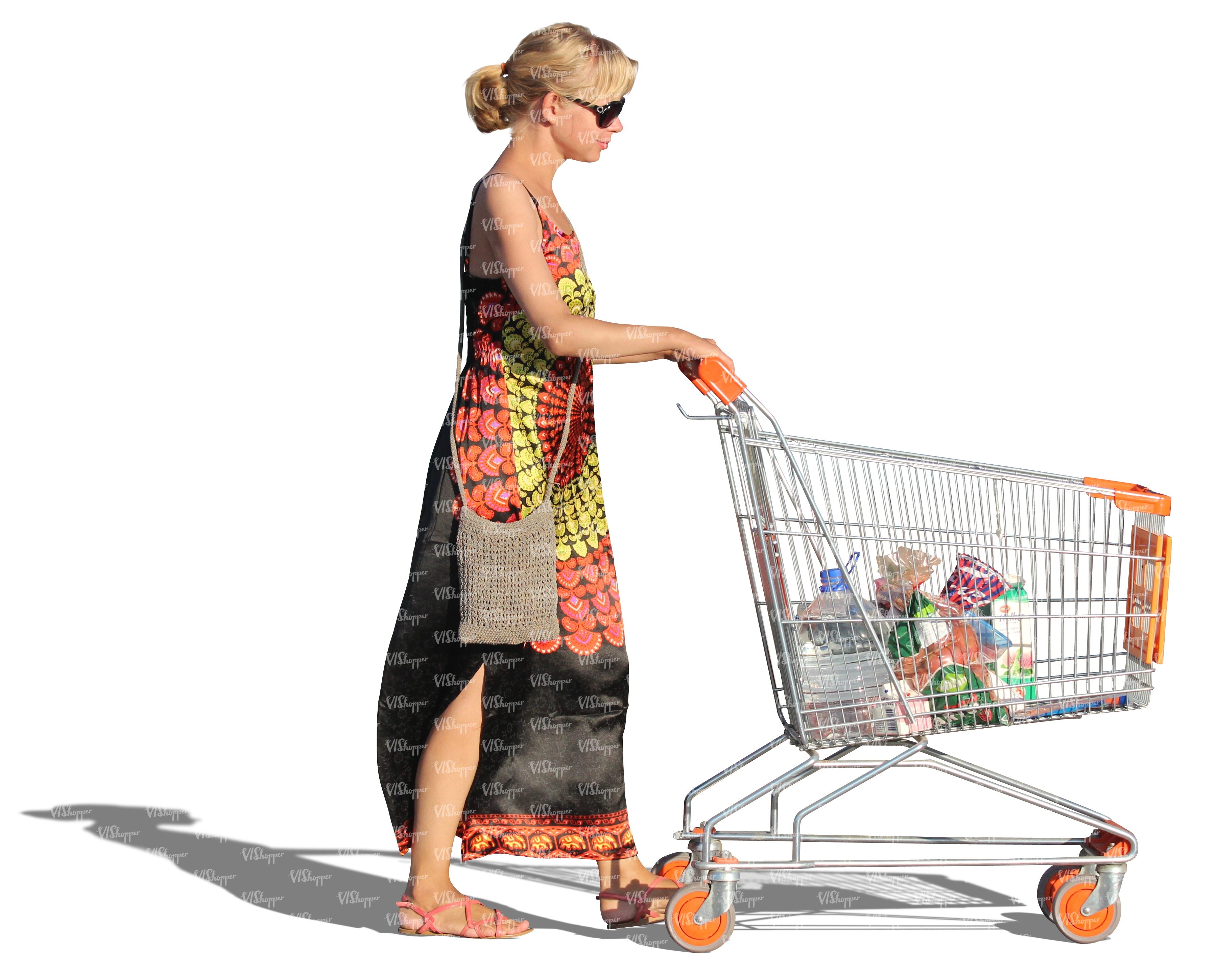 woman in a long dress pushing a shopping cart