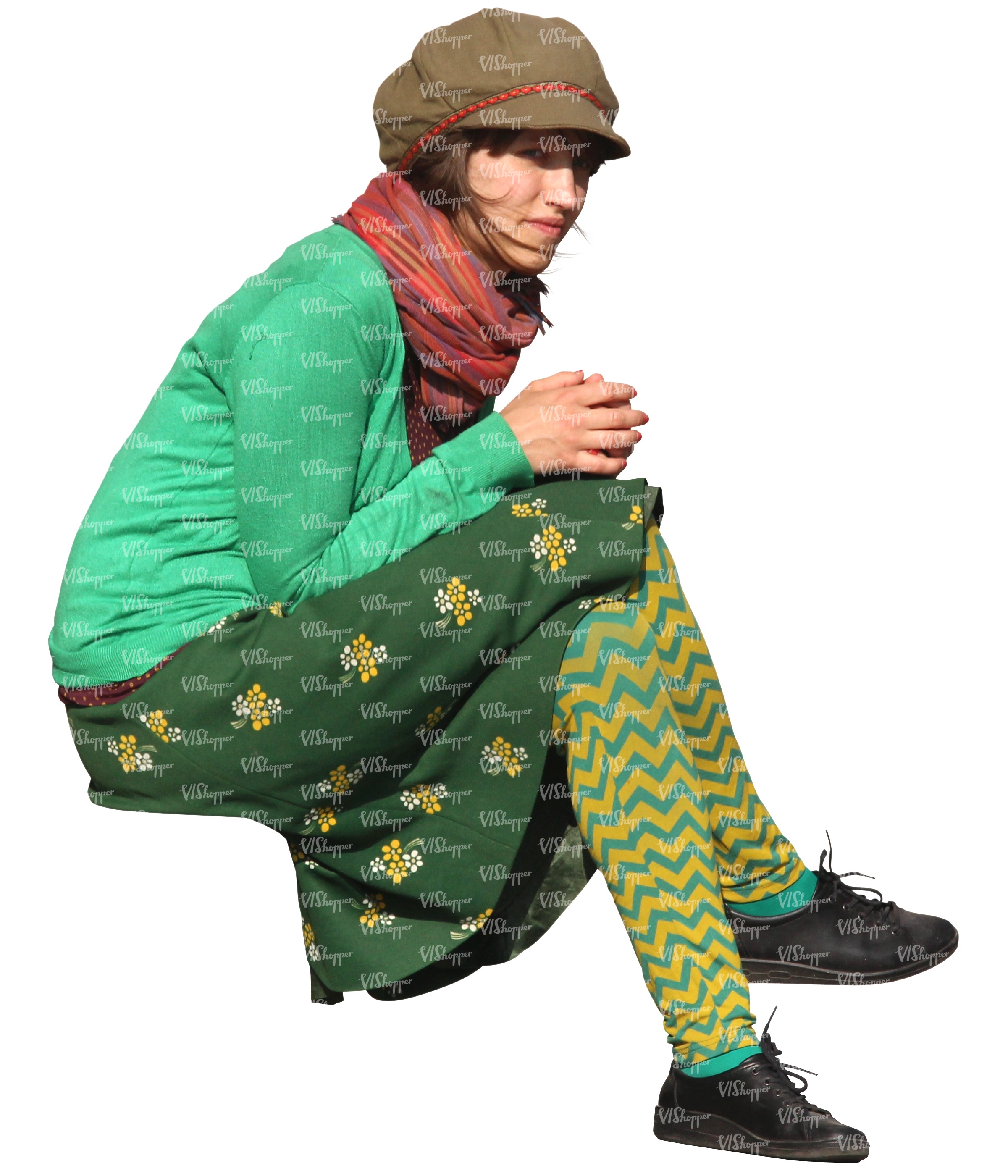 bohemian woman in a green outfit sitting - VIShopper